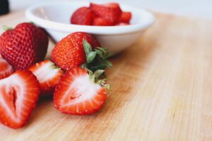 photo of strawberries on counter with bowl